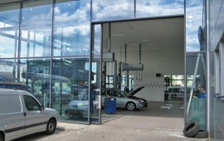 Automated entrance door in car dealership